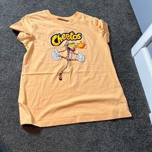 Hot Cheetos shirt 👀.
